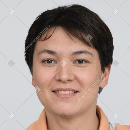 Joyful white young-adult female with short  brown hair and brown eyes