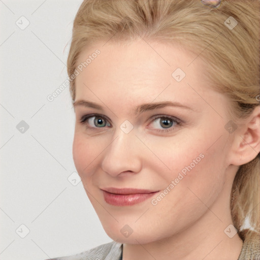 Joyful white young-adult female with medium  brown hair and blue eyes