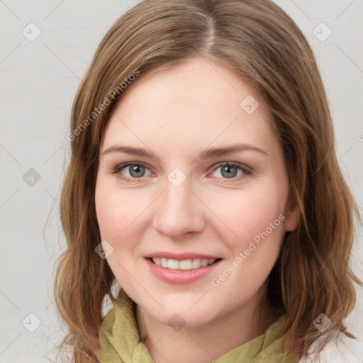 Joyful white young-adult female with medium  brown hair and green eyes