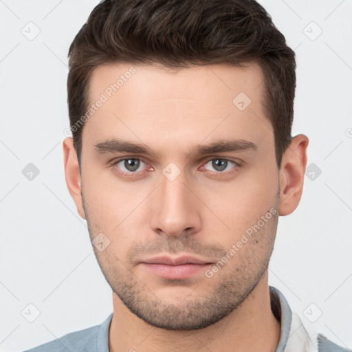 Neutral white young-adult male with short  brown hair and brown eyes