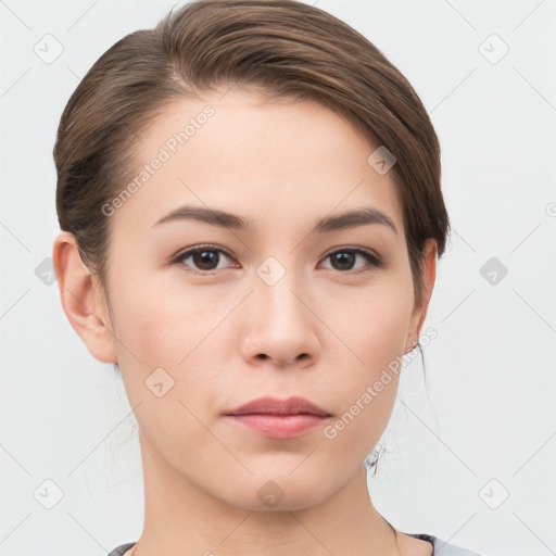 Neutral white young-adult female with short  brown hair and brown eyes