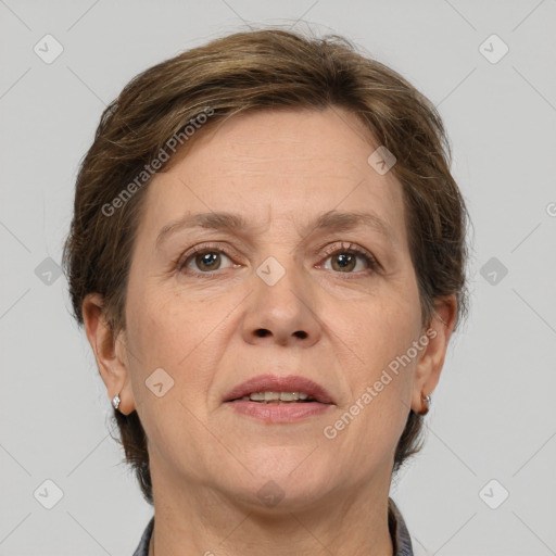 Joyful white adult female with medium  brown hair and grey eyes