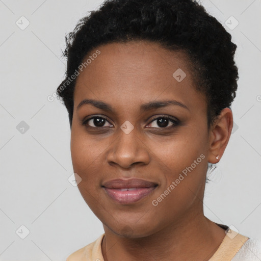 Joyful black young-adult female with short  brown hair and brown eyes