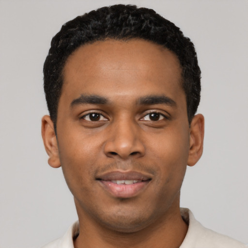 Neutral black young-adult male with short  black hair and brown eyes