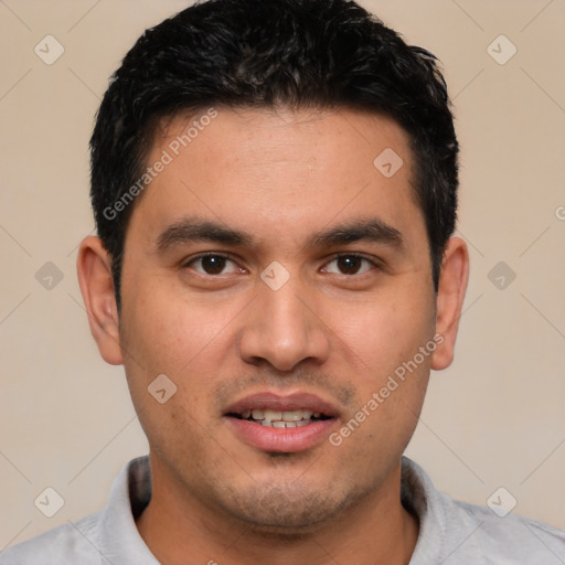 Joyful white young-adult male with short  black hair and brown eyes