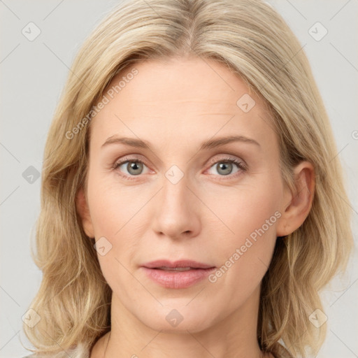 Joyful white young-adult female with medium  brown hair and blue eyes