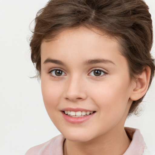 Joyful white child female with medium  brown hair and brown eyes