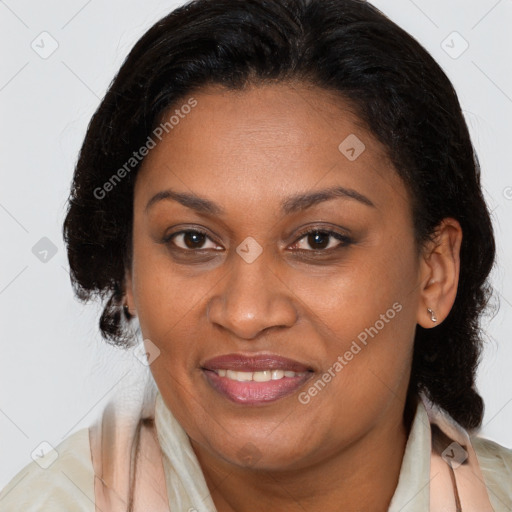 Joyful latino adult female with medium  brown hair and brown eyes