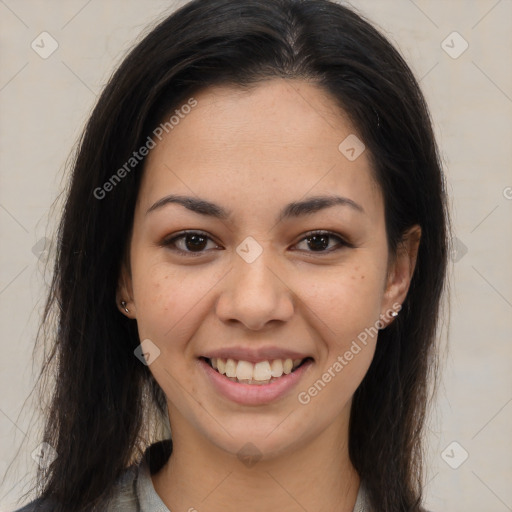 Joyful latino young-adult female with long  brown hair and brown eyes