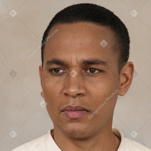 Neutral latino young-adult male with short  black hair and brown eyes