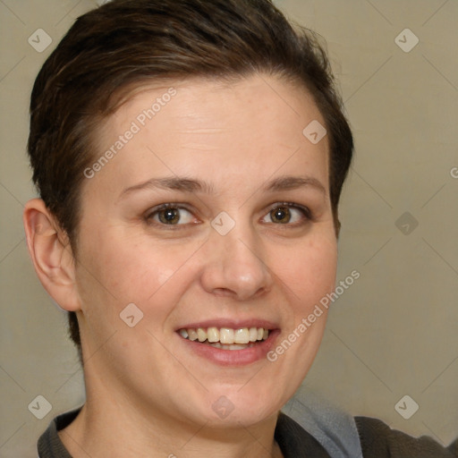 Joyful white adult female with short  brown hair and brown eyes