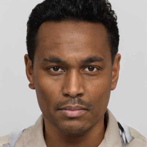 Neutral black young-adult male with short  black hair and brown eyes