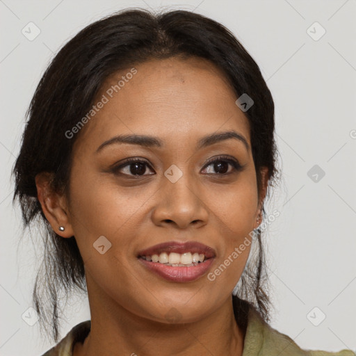 Joyful latino young-adult female with long  brown hair and brown eyes