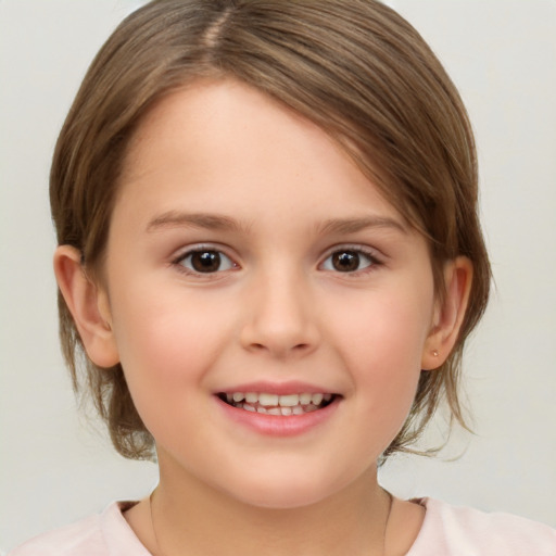 Joyful white child female with medium  brown hair and brown eyes