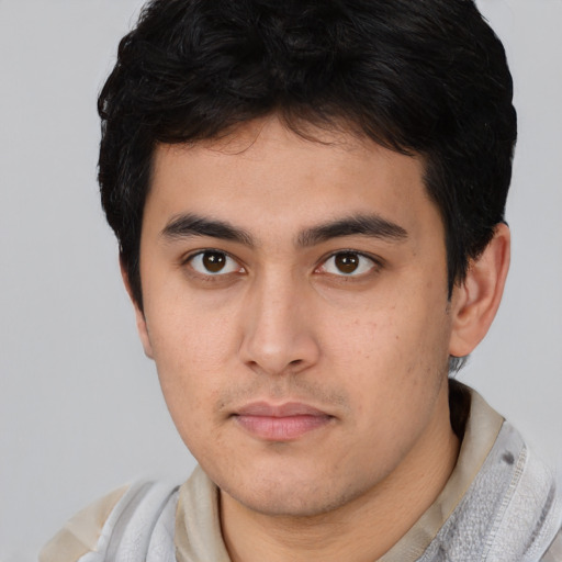 Neutral asian young-adult male with short  brown hair and brown eyes