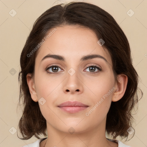 Neutral white young-adult female with medium  brown hair and brown eyes