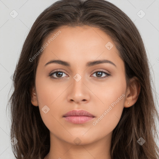 Neutral white young-adult female with long  brown hair and brown eyes