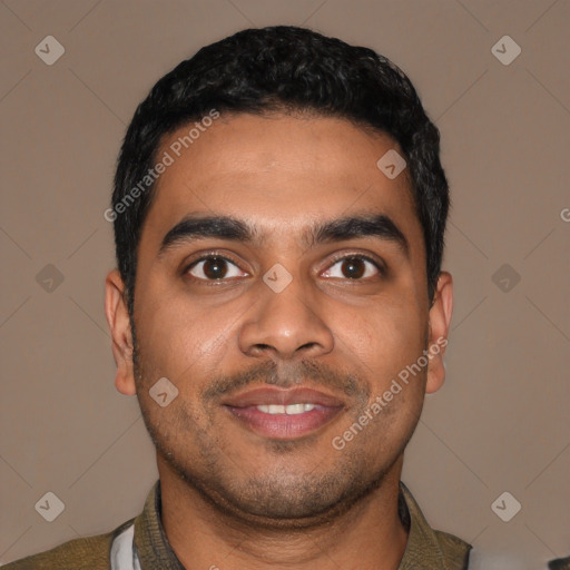 Joyful latino young-adult male with short  black hair and brown eyes