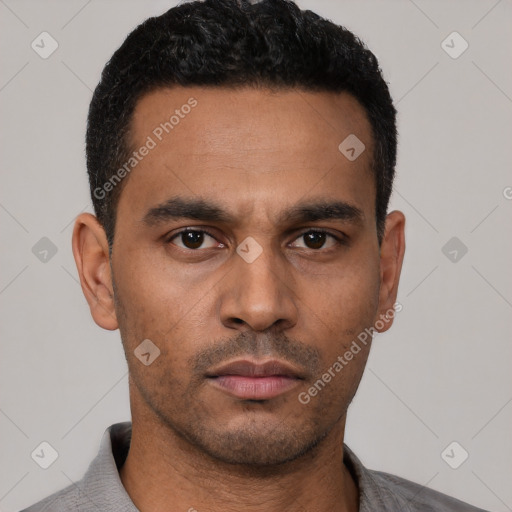 Neutral latino young-adult male with short  black hair and brown eyes
