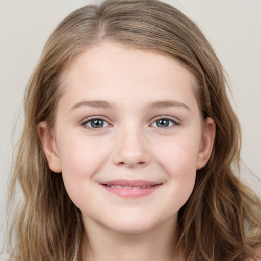 Joyful white child female with long  brown hair and grey eyes