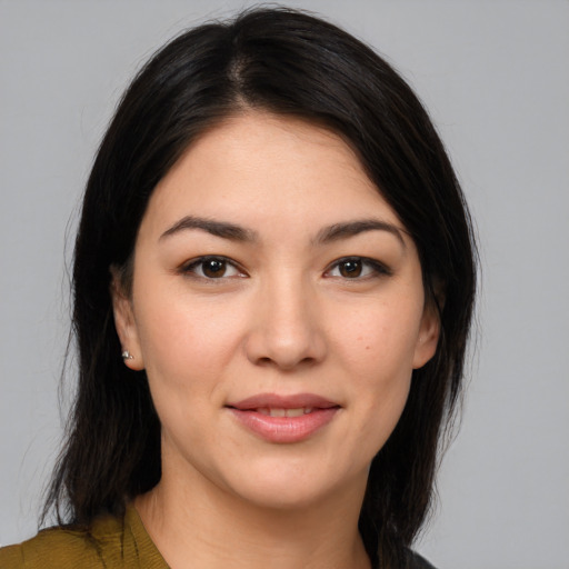 Joyful white young-adult female with medium  black hair and brown eyes