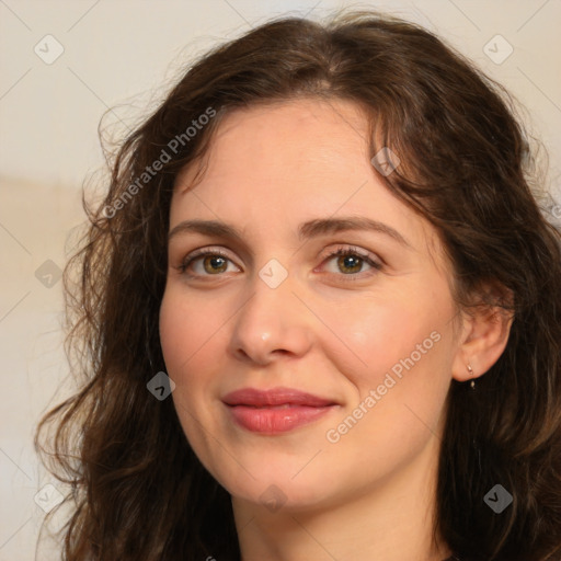 Joyful white young-adult female with long  brown hair and green eyes