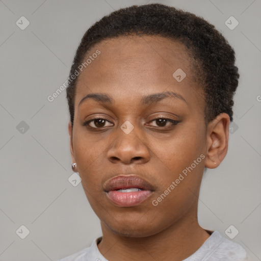 Neutral black young-adult female with short  brown hair and brown eyes