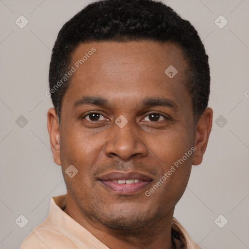 Joyful latino young-adult male with short  brown hair and brown eyes