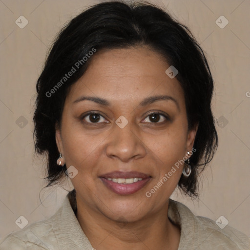 Joyful black adult female with medium  brown hair and brown eyes