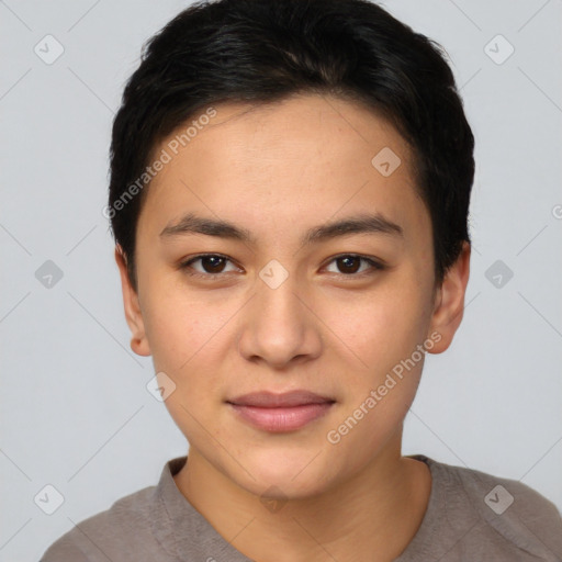 Joyful asian young-adult female with short  brown hair and brown eyes