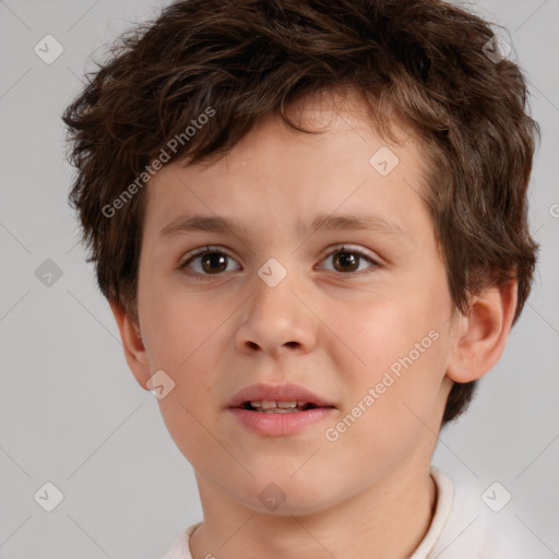 Joyful white child male with short  brown hair and brown eyes