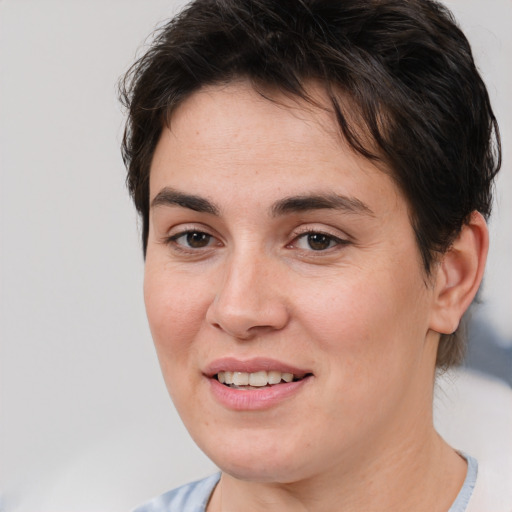 Joyful white young-adult female with medium  brown hair and brown eyes