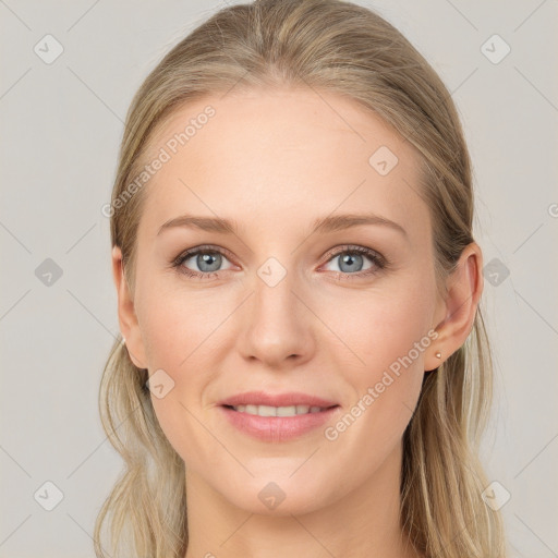 Joyful white young-adult female with long  brown hair and blue eyes