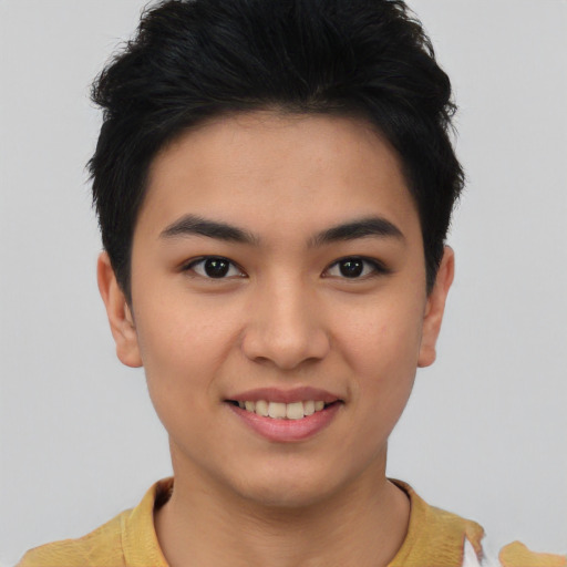 Joyful asian young-adult female with short  black hair and brown eyes