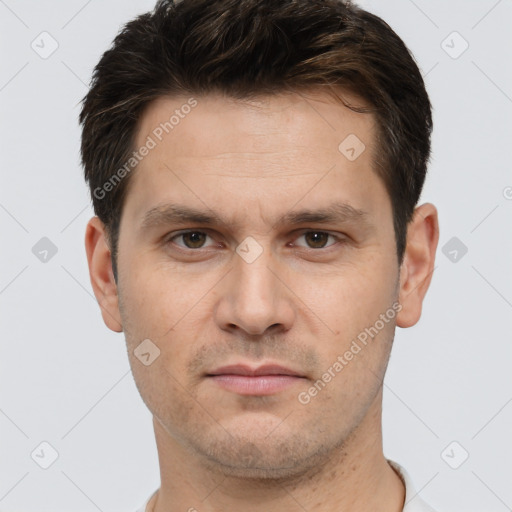 Neutral white adult male with short  brown hair and brown eyes