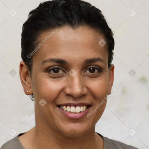 Joyful latino young-adult female with short  brown hair and brown eyes