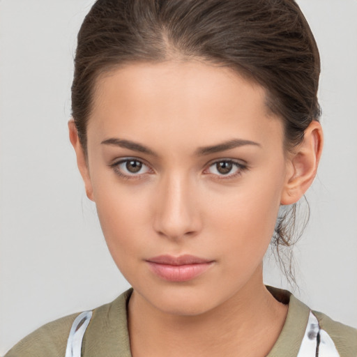 Neutral white young-adult female with short  brown hair and brown eyes