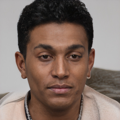 Neutral latino young-adult male with short  brown hair and brown eyes