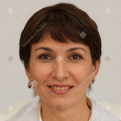 Joyful white adult female with medium  brown hair and brown eyes