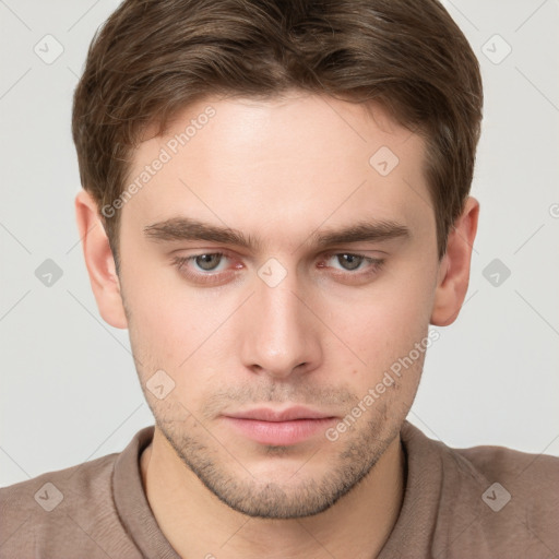 Neutral white young-adult male with short  brown hair and grey eyes