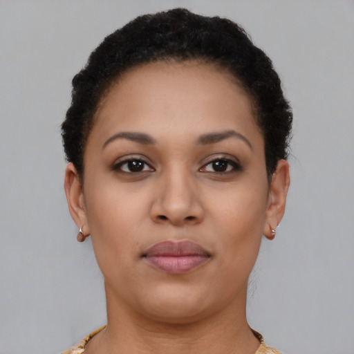 Neutral latino young-adult female with short  brown hair and brown eyes