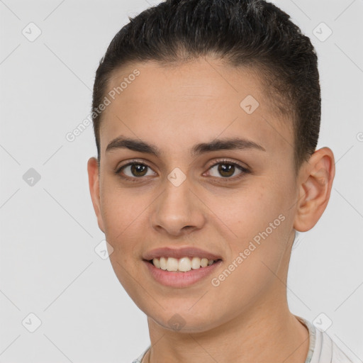 Joyful white young-adult female with short  brown hair and brown eyes