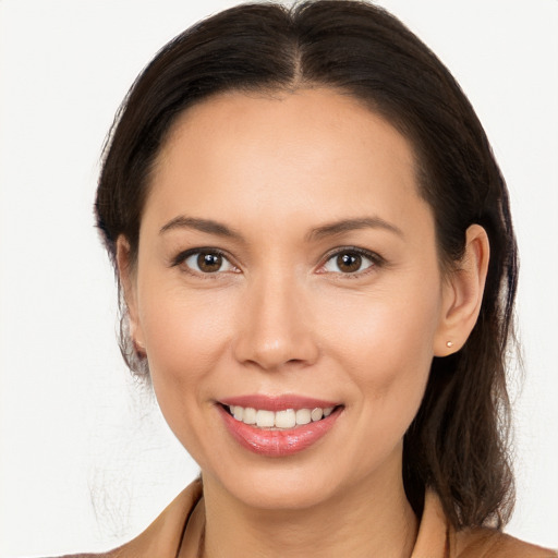 Joyful white young-adult female with medium  brown hair and brown eyes