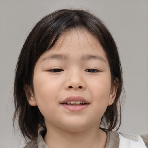 Joyful asian child female with medium  brown hair and brown eyes