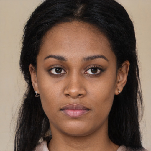 Neutral latino young-adult female with long  black hair and brown eyes