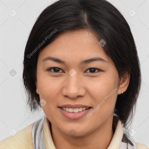 Joyful asian young-adult female with medium  brown hair and brown eyes