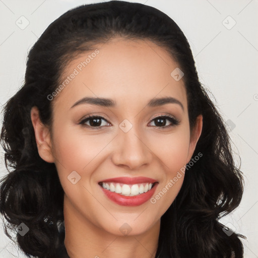 Joyful white young-adult female with long  black hair and brown eyes