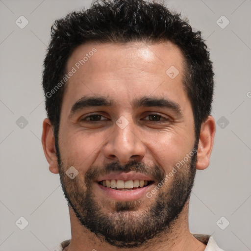 Joyful white young-adult male with short  black hair and brown eyes