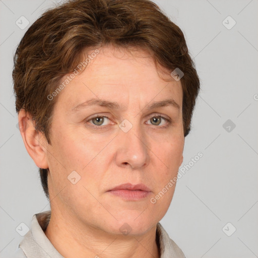 Neutral white adult female with short  brown hair and grey eyes