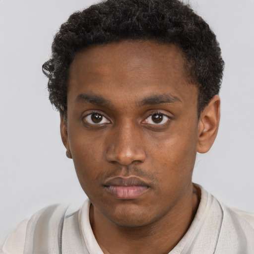 Neutral black young-adult male with short  brown hair and brown eyes
